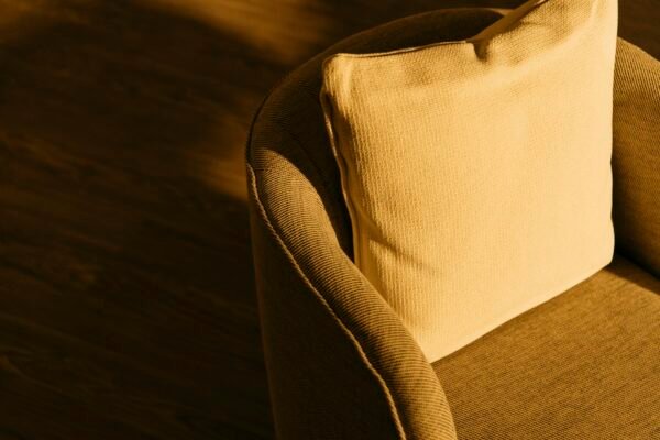 Close-up of a textured cushion showing rich fabric detail