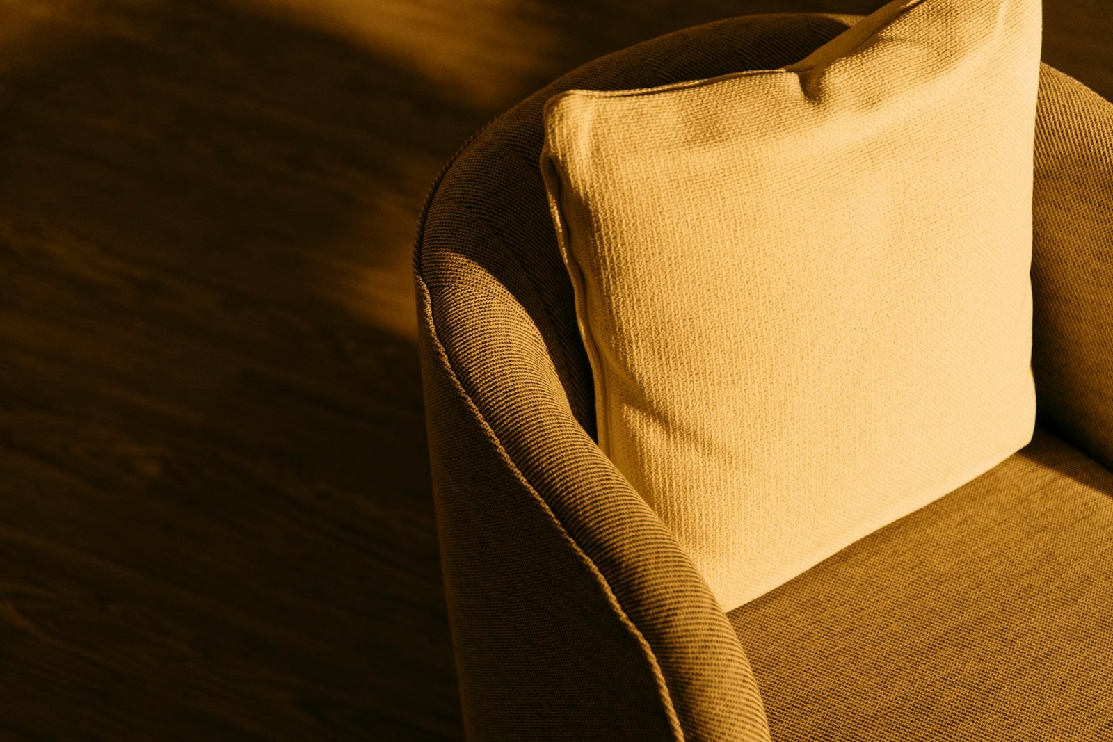 Close-up of a textured cushion showing rich fabric detail